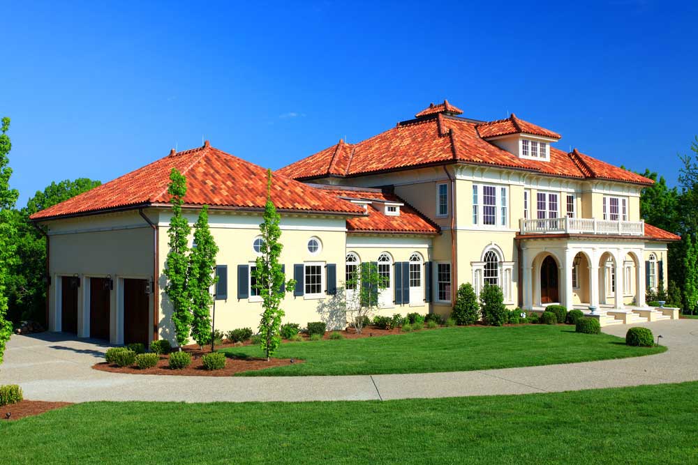 Spanish style terra cotta roof with copper gutters